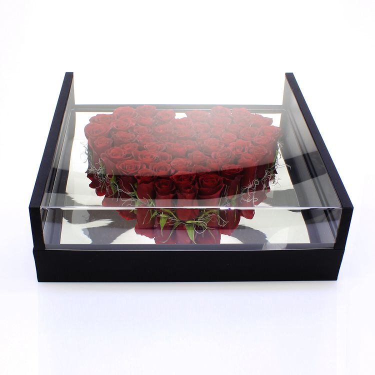 Roses in heart and plexiglass box