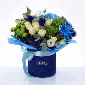 White and blue flowers in velvet box!