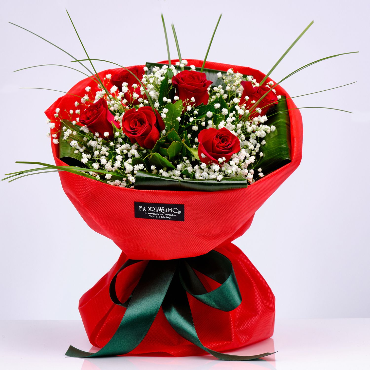 Round Bouquet Of Red Roses and Greens