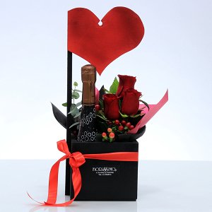 Wooden container with roses and wine!