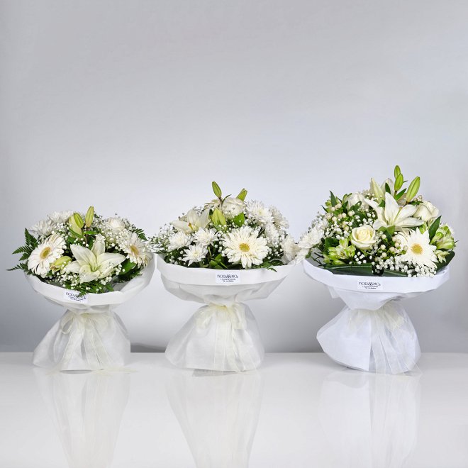 All white bouquet seasonal flowers
