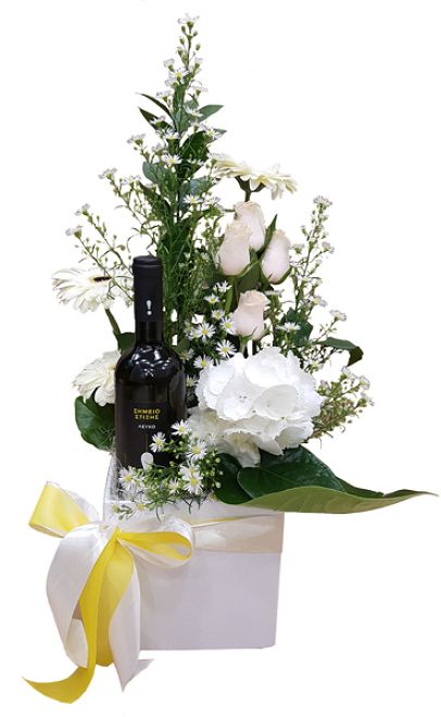 Arrangement of flowers and wine