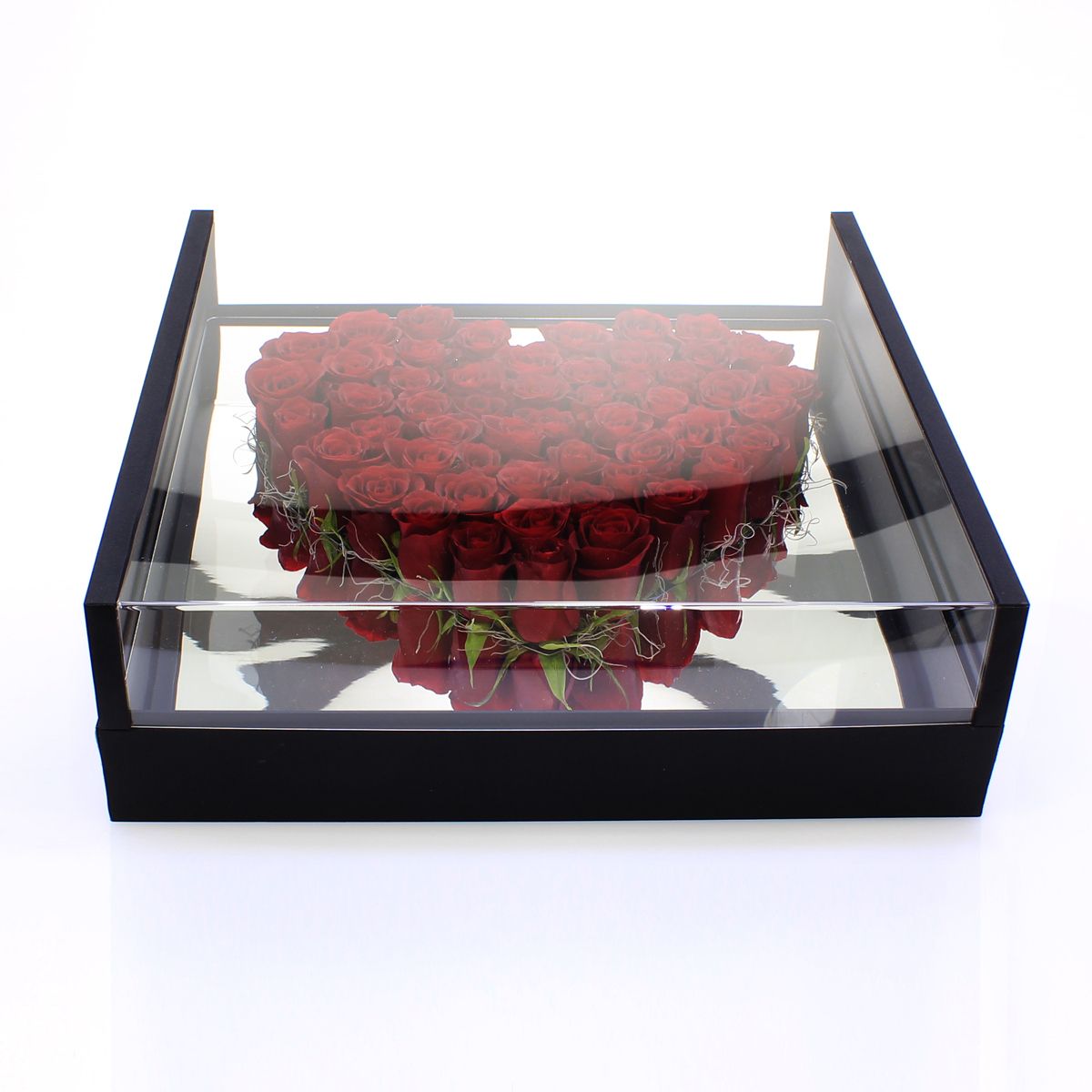 Roses in heart and plexiglass box