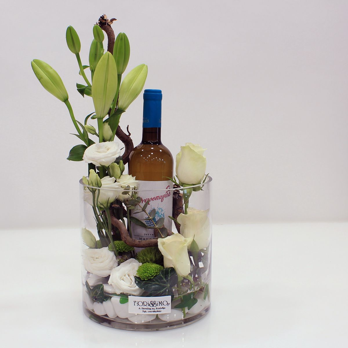 Glass vase with flowers and wine!