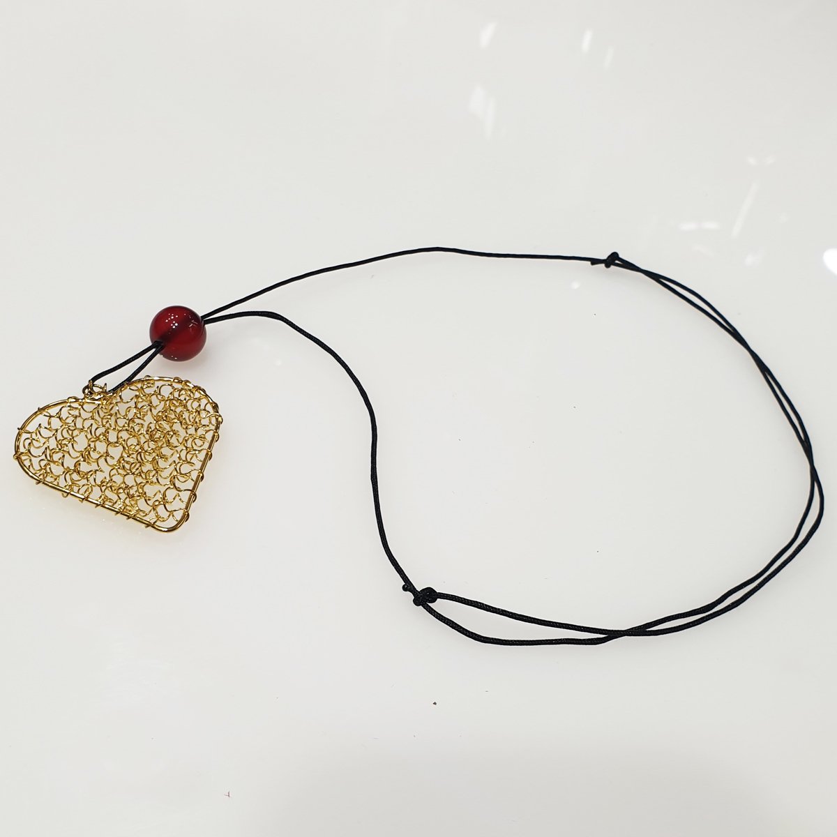 Neclace twisted heart gold