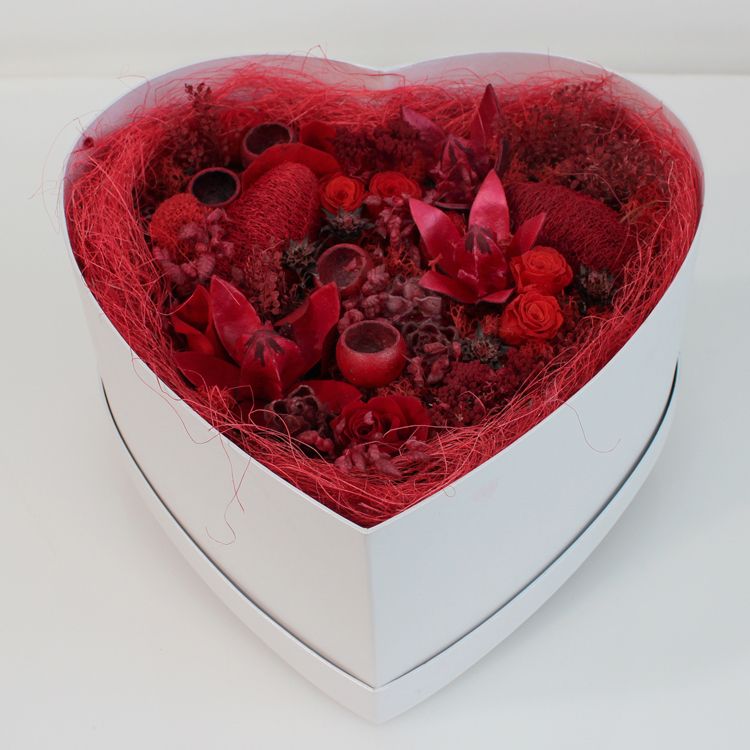 Dry flowers in a heart box