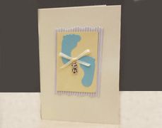 Handmade card with babys foot for a boy.